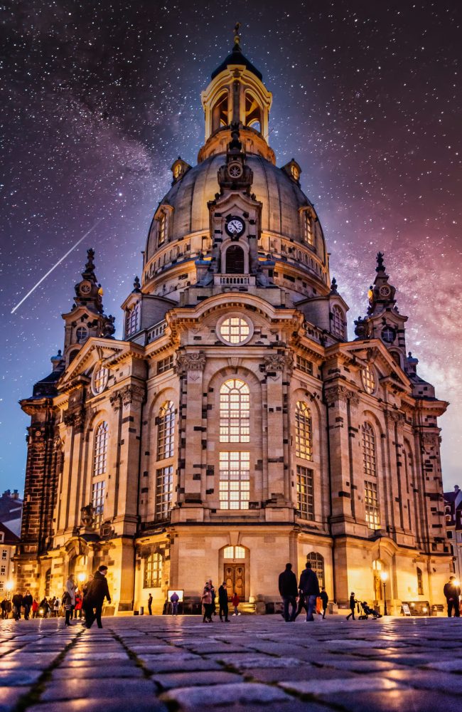A beautiful low angle photo of Frauenkirche Lutheran church in Dresden, Germany under night sky