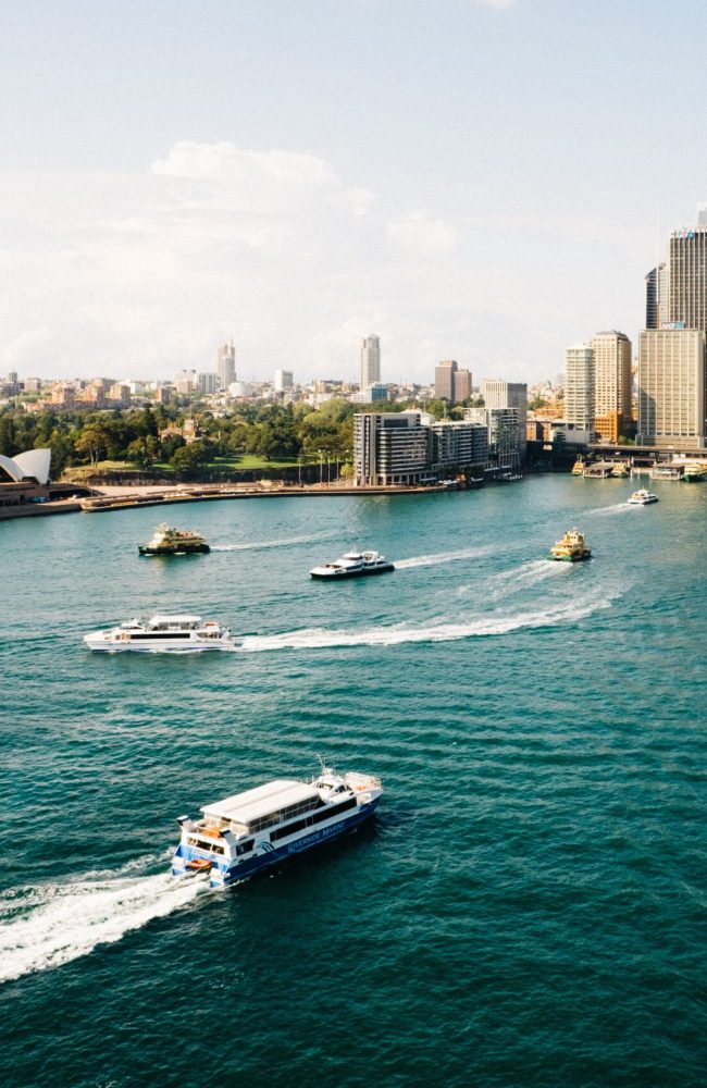 boat-is-sailing-water-with-few-boats-water