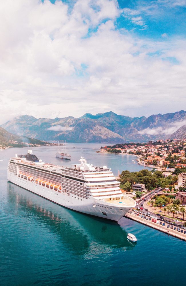 moored cruise liner in bay at dock, top view