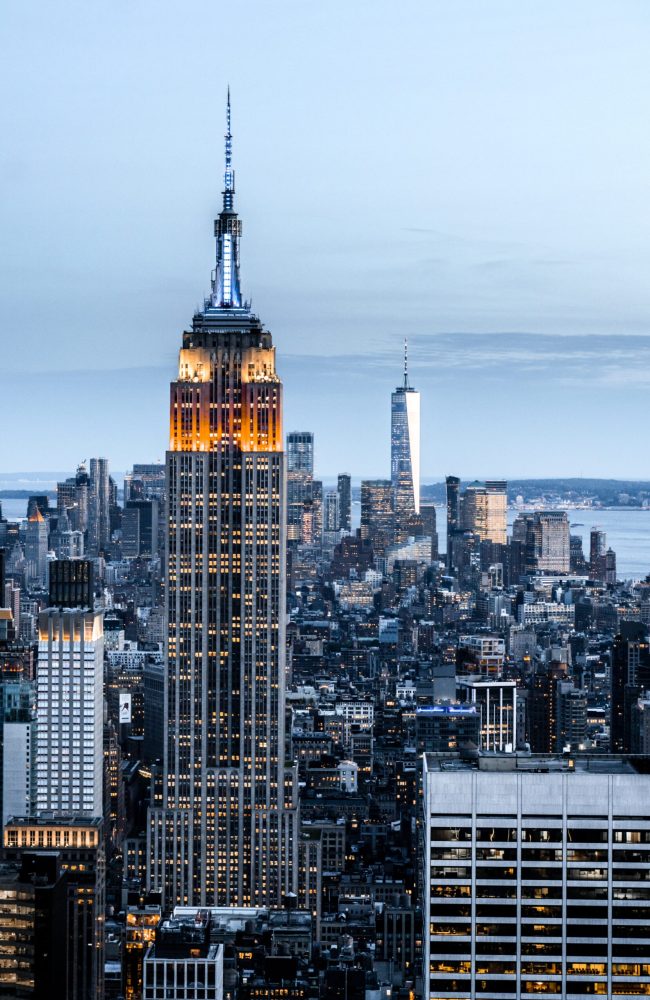 A vertical shot of a cityscape with tall skyscrapers in New York, USA