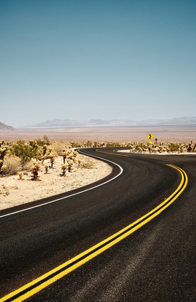 A vertical shot of a road in Joshua Tree National Park, California USA
